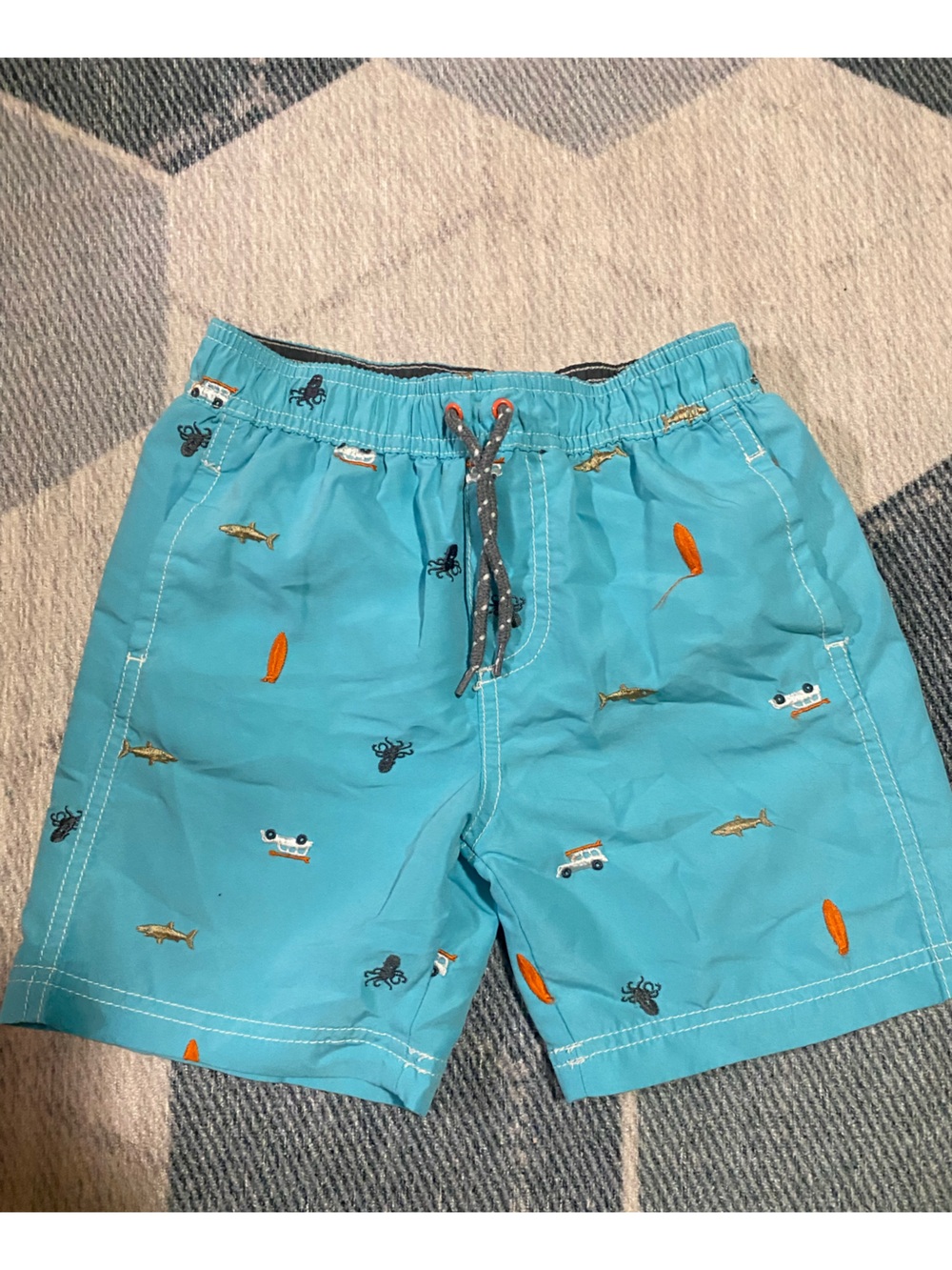 Carter’s boys Swim Trunks with embroidered sea creatures